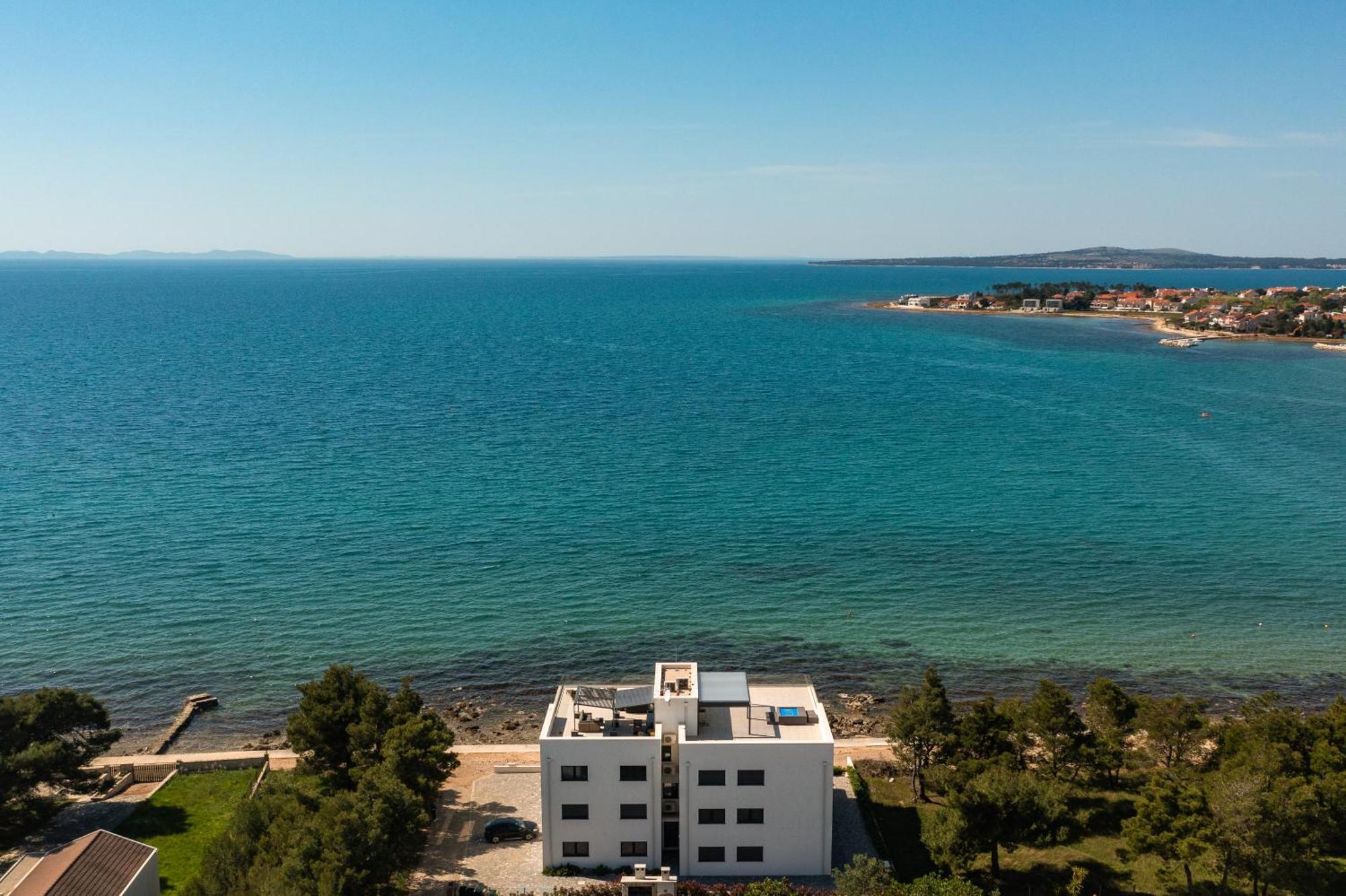 Aqua Blue By Belmont Realty